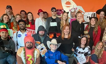 A group of Quantum Workplace employees dressed up for halloween