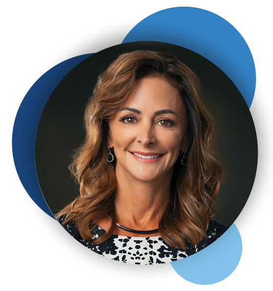 Headshot of Julie Cummings from BKD with blue circles behind image